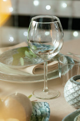 Empty wine glass on a restaurant table