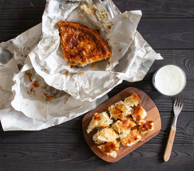 Burek or Borek savory pastry pie from the balkans served with yogurt top view.