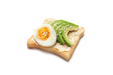 Toast with avocado and egg isolated on white background