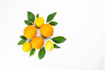 oranges and lemons on wooden table