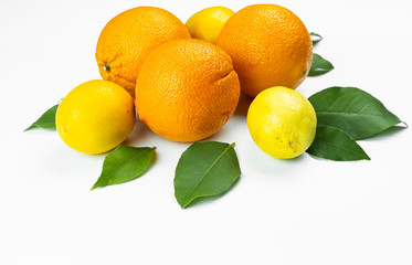 oranges and lemons on wooden table