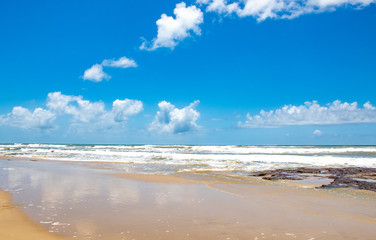 Torres Beach and reflections of the sky on a sunny day in Prainha