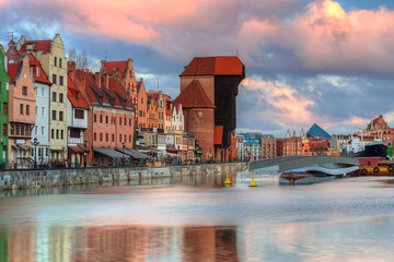 Beautiful scenery of the old town in Gdansk over Motlawa river at sunrise, Poland. © Patryk Kosmider