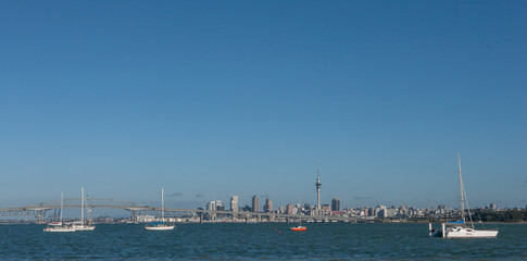 Fototapeta na wymiar Auckland New Zealand Skyline. Boats in front. Panorama.