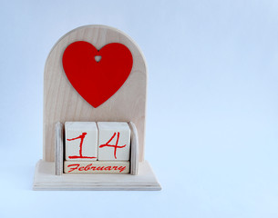 Wooden calendar with cubes February 14