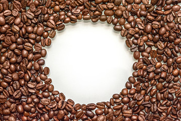abstract background of coffee beans with copy space in the middle