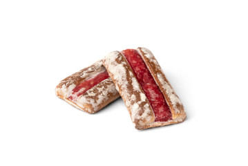 Traditional Russian gingerbread with cherry or raspberry filling isolated on white background.
