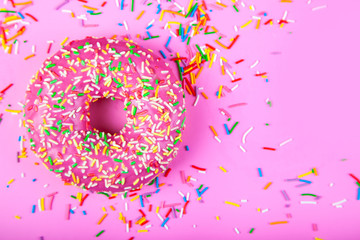 Donut on a pink background.