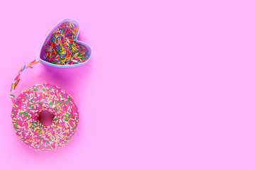 Donuts on a pink background.