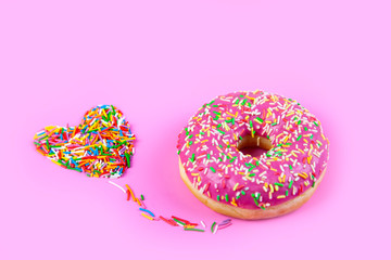 Donuts on a pink background.