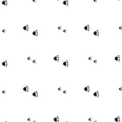 Seamless background with black cat tracks. Endless pattern on white background for your design.