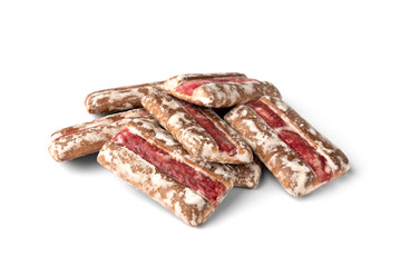 Traditional Russian gingerbread with cherry or raspberry filling isolated on white background.