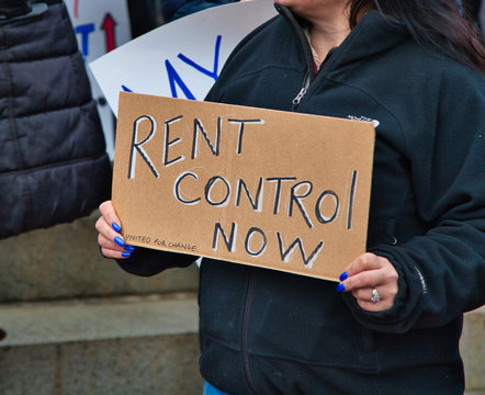 Rent Control Now (cardboard sign)