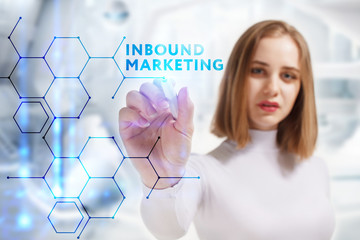 Business, Technology, Internet and network concept. Young businessman working on a virtual screen of the future and sees the inscription: Inbound marketing