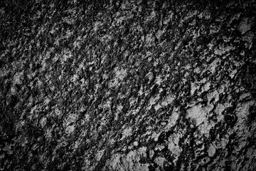 The surface. The asphalt is black.