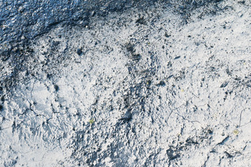 The surface. The asphalt is black.