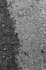 The surface. The asphalt is black.