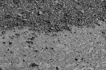 The surface. The asphalt is black.