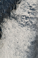 The surface. The asphalt is black.