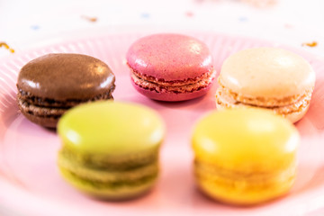 Fototapeta premium Several French multicolored macarons during a party
