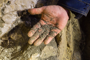 Gold ore pyrite specimen in miners hand