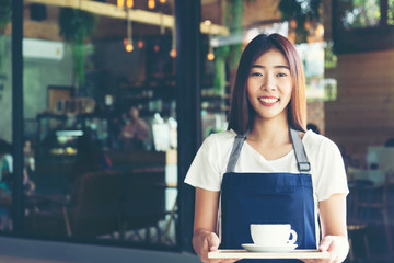 Barista asian women Cafe Making Coffee Preparation. Service Concept