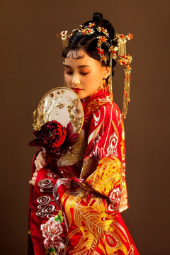 Asian Girl In Red Chinese Traditional Costume