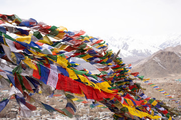 Indian and tibetan tied prayer and blessing flags on mount of Thiksey monastery and Namgyal Tsemo Gompa in Leh ladakh on March 21, 2019 in Jammu and Kashmir, India