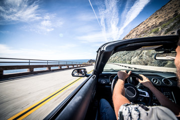 Man driving his sport car