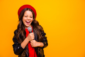 Close-up portrait of her she nice-looking attractive charming trendy fashionable cheerful wavy-haired girl singing karaoke hit isolated over bright vivid shine vibrant yellow color background