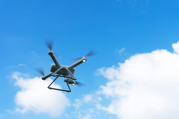 Close up Drone flying a cloudy sky