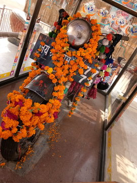Marble flower garland on the motorcycle of the famous temple of Rajasthan, Om Banna Sa