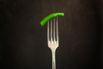 asparagus beans, green pod on a fork (ready to eat vegetables) menu concept. food background. top...