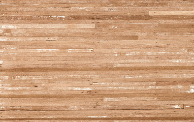 Wood texture background of old scratched wooden planks in light brown beige color with some cracks.