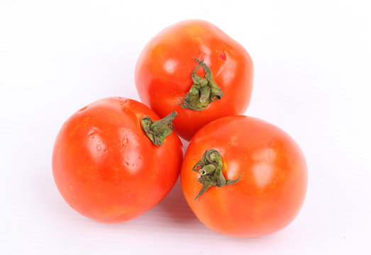 Tomato on isolated white background 