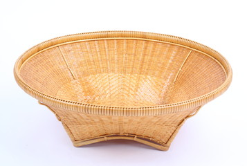 woven (bamboo and rattan) basket on white background 