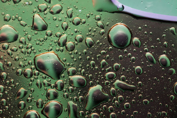 abstract background - waterdrops on green background. Horizontal image