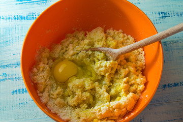 The egg is added to the dough.