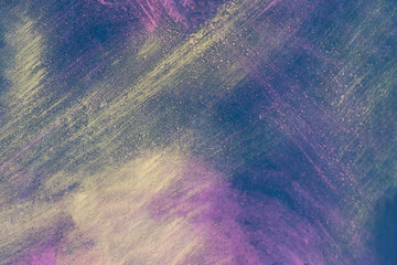 A piece of metal with a decorative coating