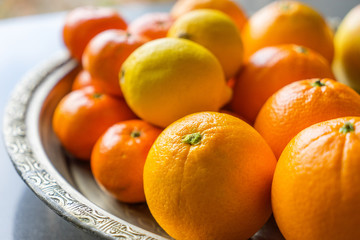 Bowl with fresh citrus fruit