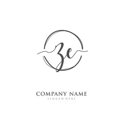 Handwritten initial letter Z E ZE for identity and logo. Vector logo template with handwriting and signature style.