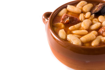 Typical Spanish fabada asturiana isolated on white background. Copy space	