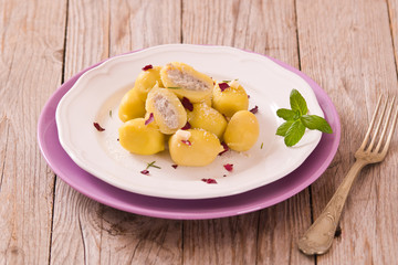Potato gnocchi stuffed with radicchio and ricotta.