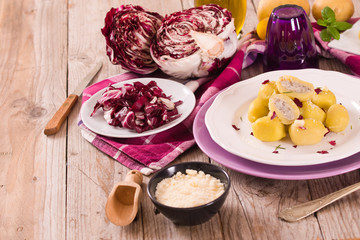 Potato gnocchi stuffed with radicchio and ricotta.