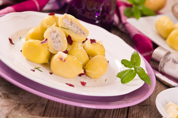 Potato gnocchi stuffed with radicchio and ricotta.