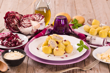 Potato gnocchi stuffed with radicchio and ricotta.