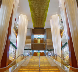 Staircase or stairs in lobby or atrium on luxury cruiseship or cruise ship liner