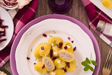 Potato gnocchi stuffed with radicchio and ricotta.