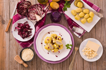 Potato gnocchi stuffed with radicchio and ricotta.