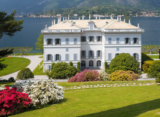 BELAGGIO, ITALY - MAY 10, 2015: The Villa Melzi on the waterfront of Como lake and the gardens.